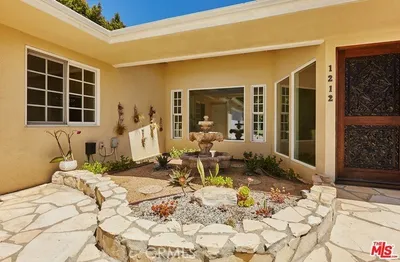 1212 San Vicente photo 2