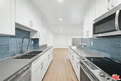 136 S Palm Drive 103