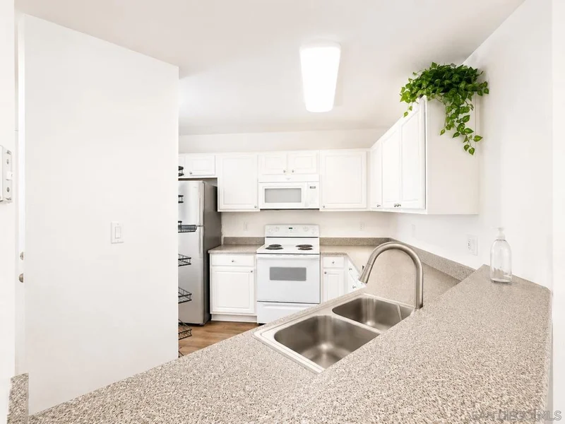 Photo 2 of 7405 Charmant Dr 1915