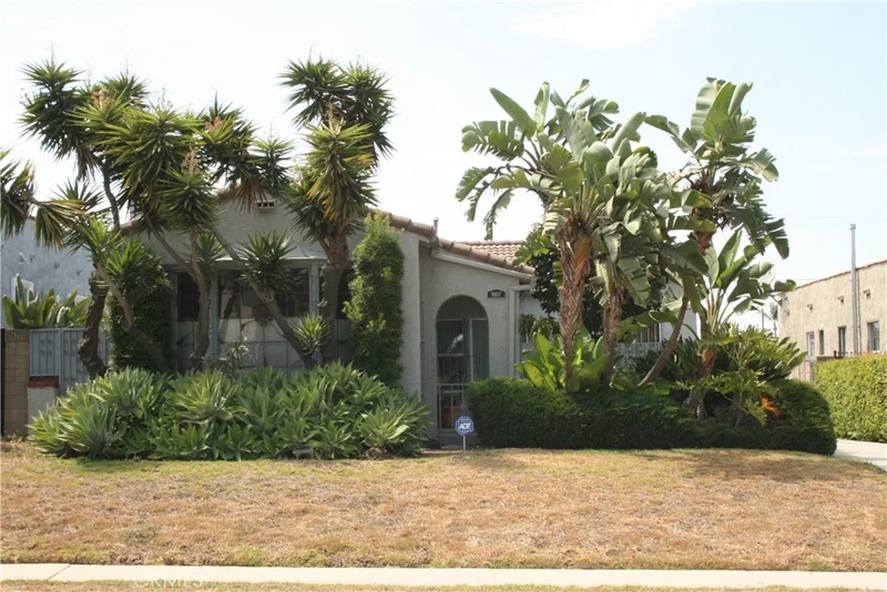 9107 Denker, Los Angeles, CA 90047